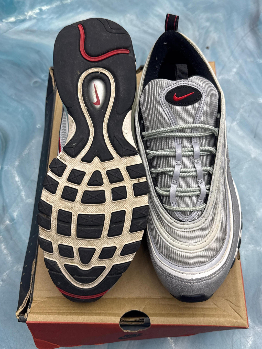 Pre-owned NIKE AIR MAX 97 Silver Bullet size 11, showing silver upper, red swoosh, and black/red outsole.