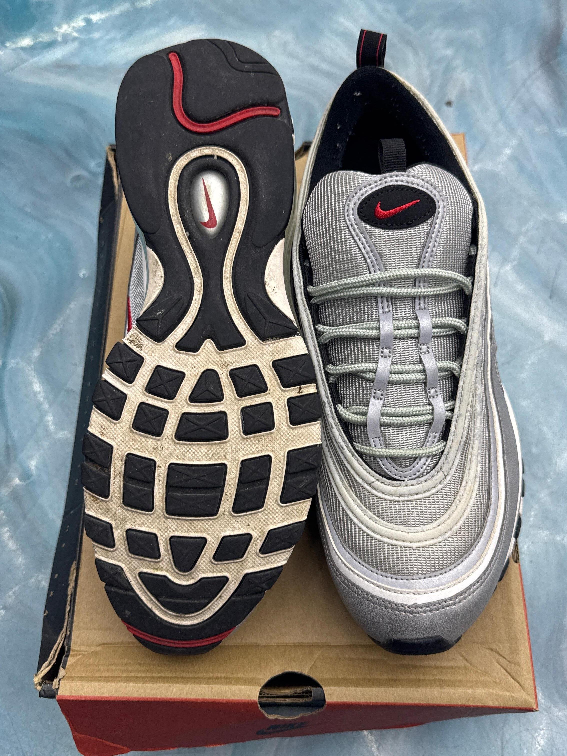 Pre-owned NIKE AIR MAX 97 Silver Bullet size 11, showing silver upper, red swoosh, and black/red outsole.
