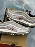Pre-owned Nike Air Max 97 Silver Bullet sneakers, size 11, with metallic silver upper, red swoosh, and visible air unit.