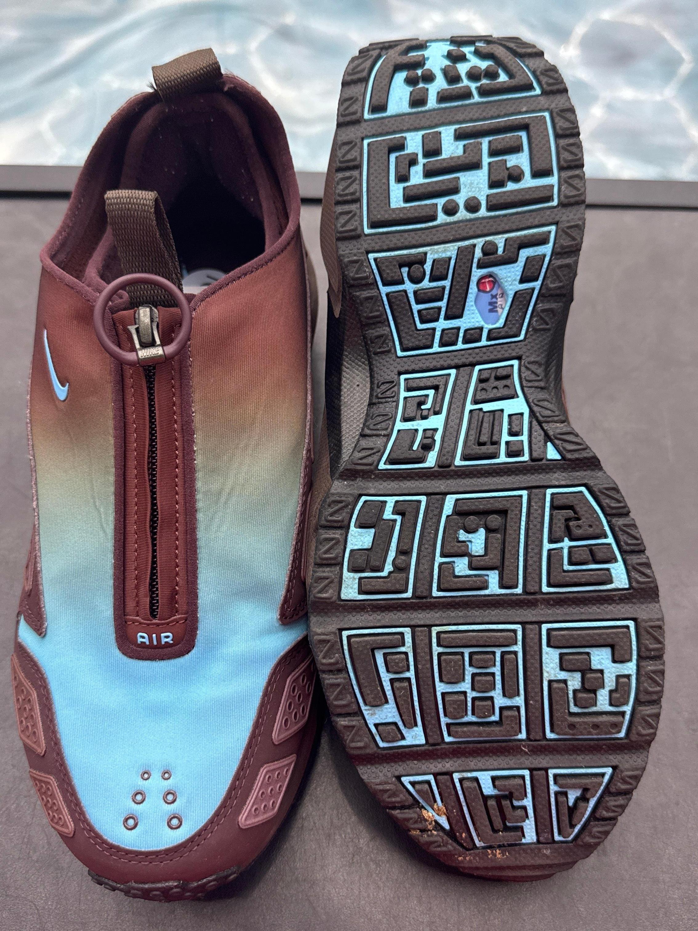 NIKE AIR MAX SUNDER pre-owned size 8M, burgundy crush and baltic blue, with zipper closure and unique sole pattern.