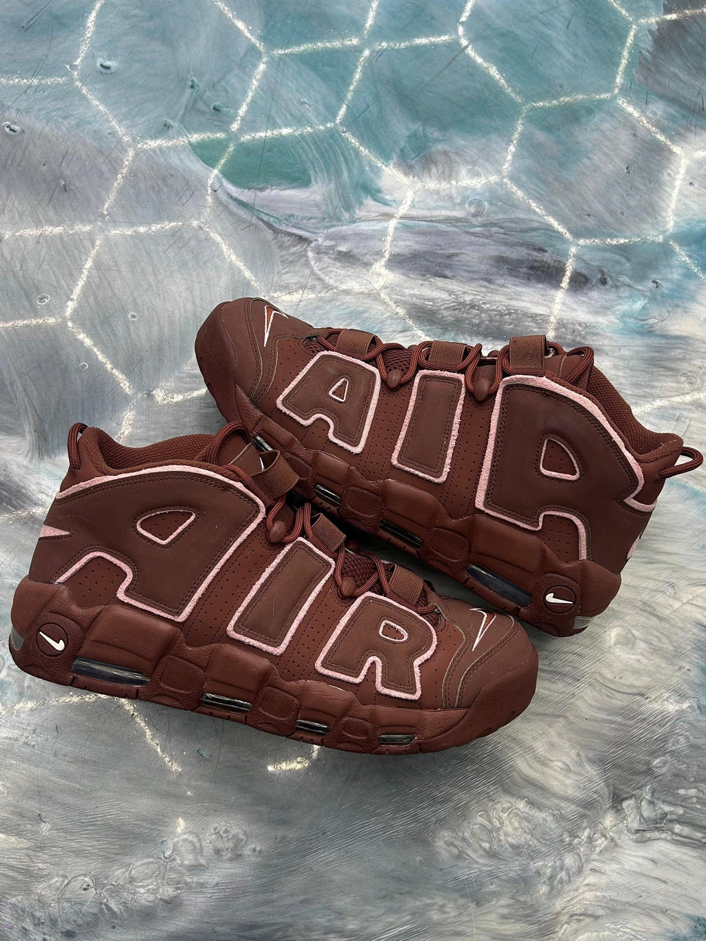 Nike Air More Uptempo 96 Valentine's Day pre-owned size 13, brown with pink "AIR" lettering.