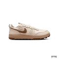 NIKE C1TY Pale Ivory Hemp Light British Tan sneaker with brown swoosh and sole.