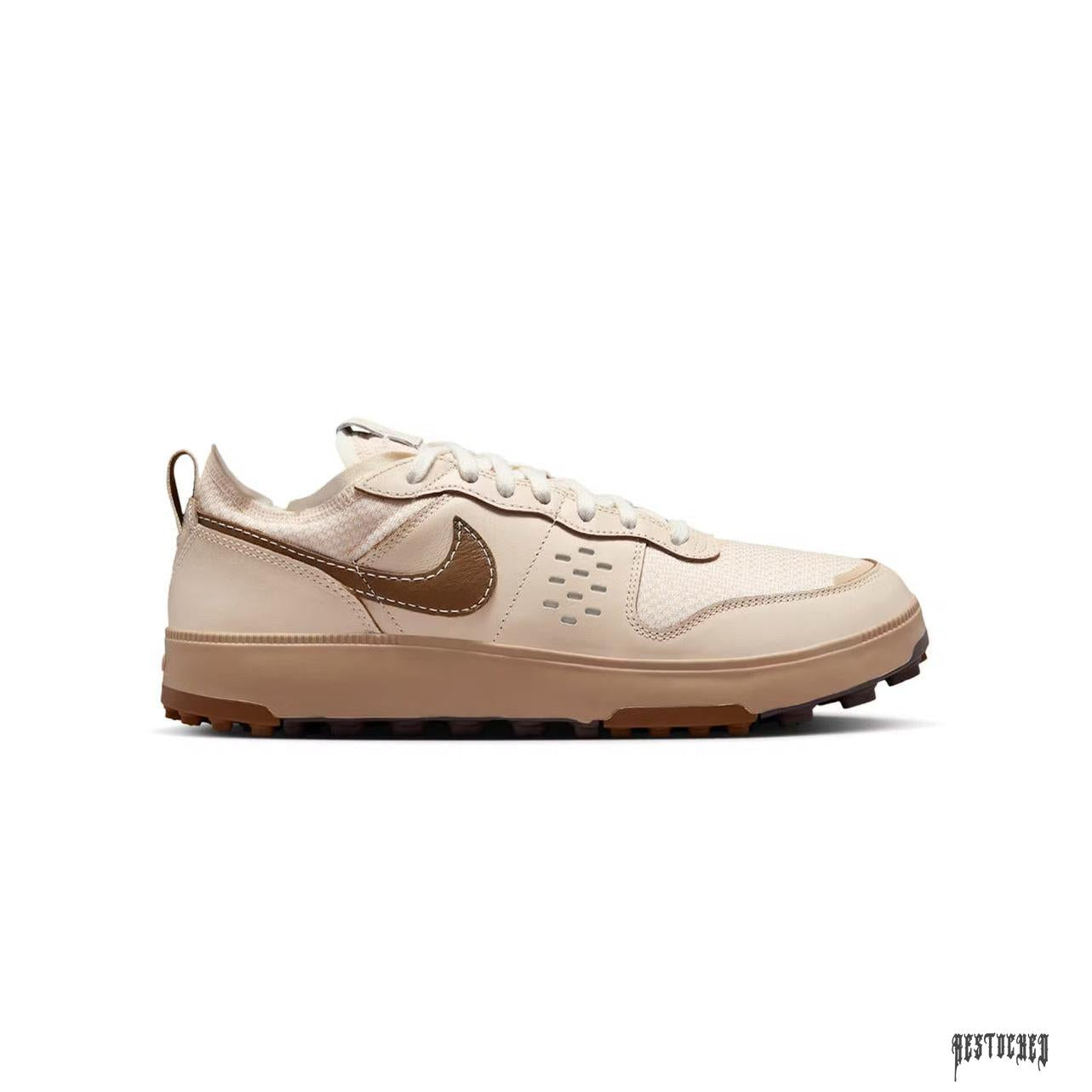 NIKE C1TY Pale Ivory Hemp Light British Tan sneaker with brown swoosh and sole.