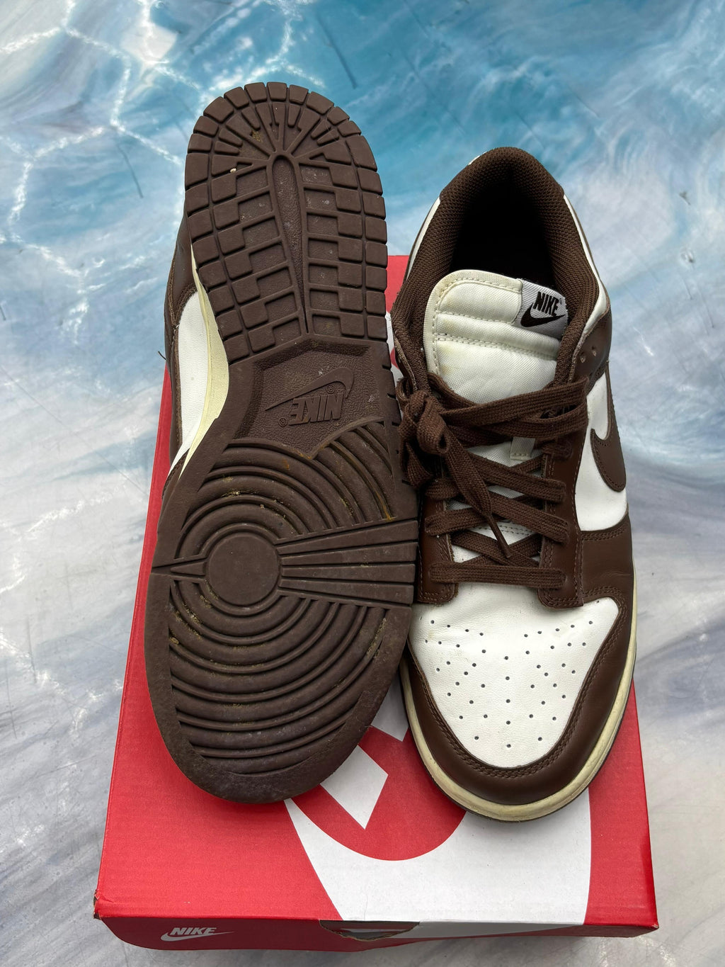 Pre-owned Nike Dunk Low Cacao Wow sneakers, brown and white leather, size 12W/10.5, with visible sole.