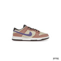 NIKE DUNK LOW SE DENIM DUSTED CLAY sneaker with beige canvas, dusty pink denim overlays, and purple swoosh.