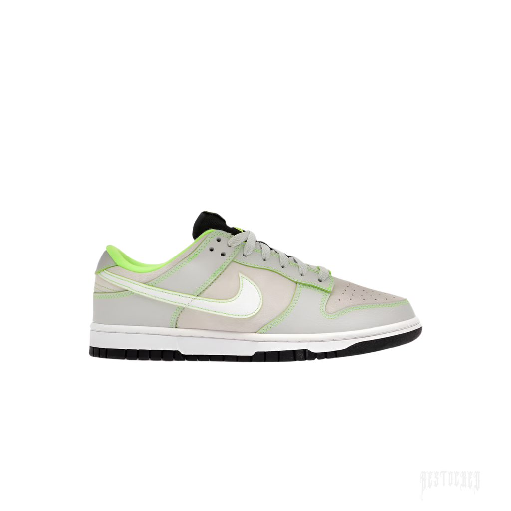 NIKE DUNK LOW University of Oregon PE: Grey leather, neon green accents, white swoosh, black sole.