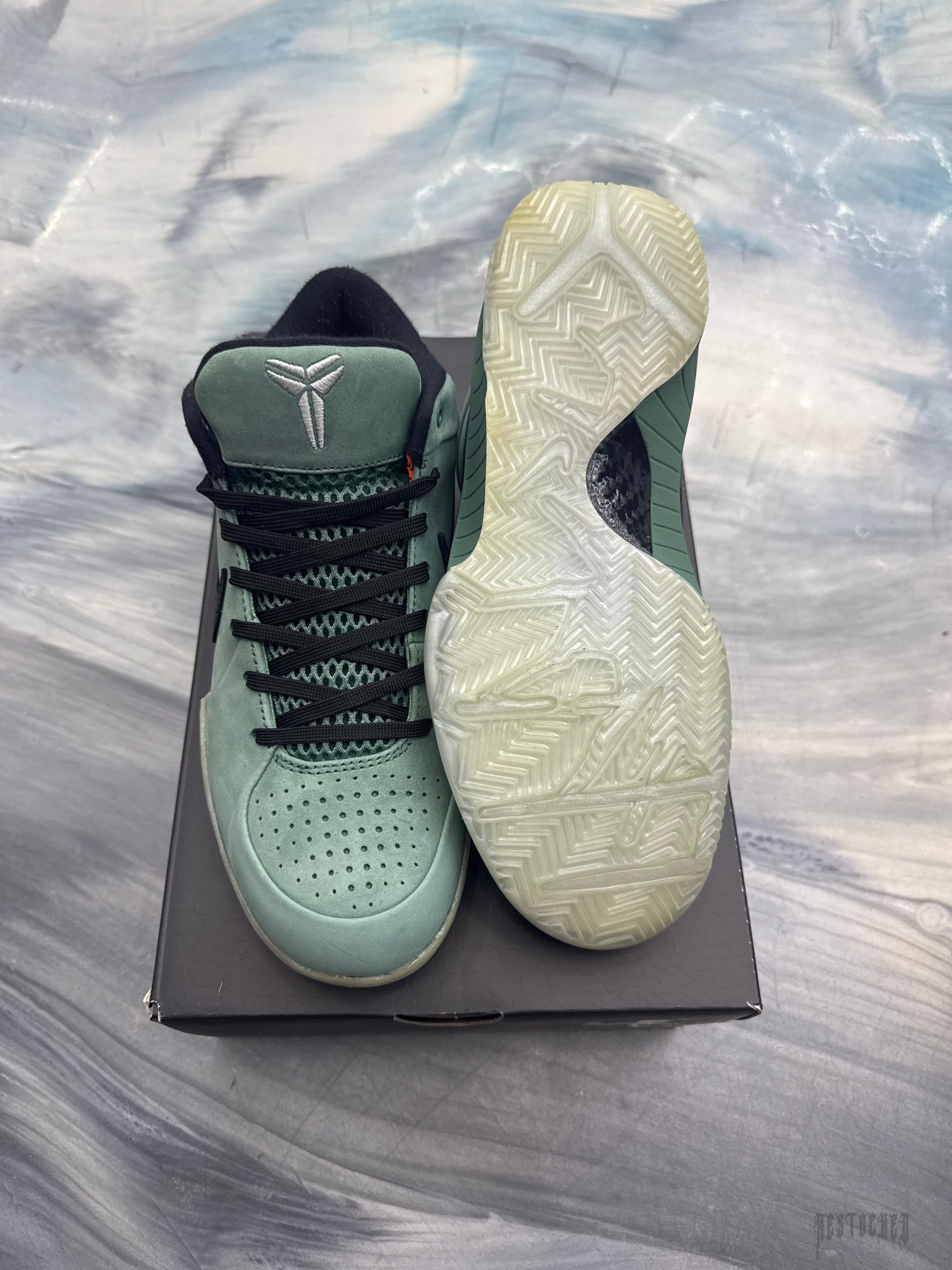 Pre-owned NIKE KOBE 4 PROTO GIRL DAD SIZE 8 sneakers in green with black laces and a translucent sole.