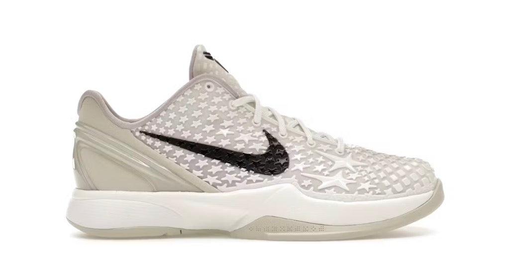 NIKE KOBE 6 SAIL ALL STAR (GS) sneaker with white star pattern, black swoosh, and sail accents.