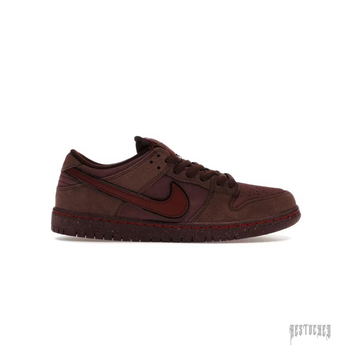 NIKE SB DUNK LOW CITY OF LOVE BURGUNDY CRUSH sneaker, dark red suede with a darker red swoosh.