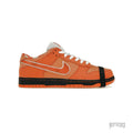 NIKE SB Dunk Low Concepts Orange Lobster sneaker with white laces and black midsole.