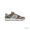 NIKE SB Dunk Low Crenshaw Skate Club with grey, red, and green patterned upper, light blue swoosh.