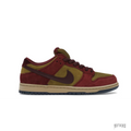 NIKE SB DUNK LOW in dark team red and olive flak suede, with a tan midsole and dark outsole.