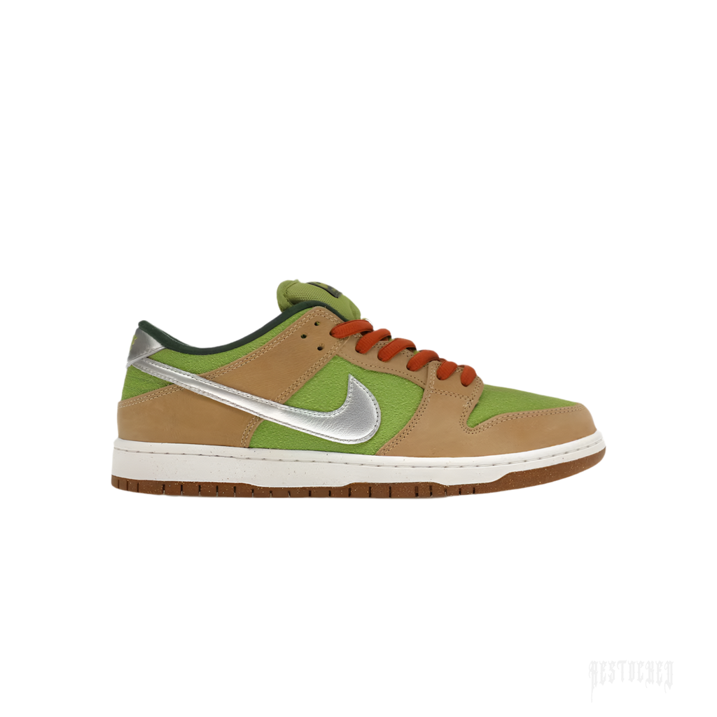 NIKE SB DUNK LOW ESCARGOT sneaker with tan leather, green suede, silver swoosh, and orange laces.