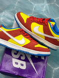 Pre-owned Nike SB Dunk Low Pro Bart Simpson sneakers, size 9.5, in red and yellow with white swoosh and blue accents.