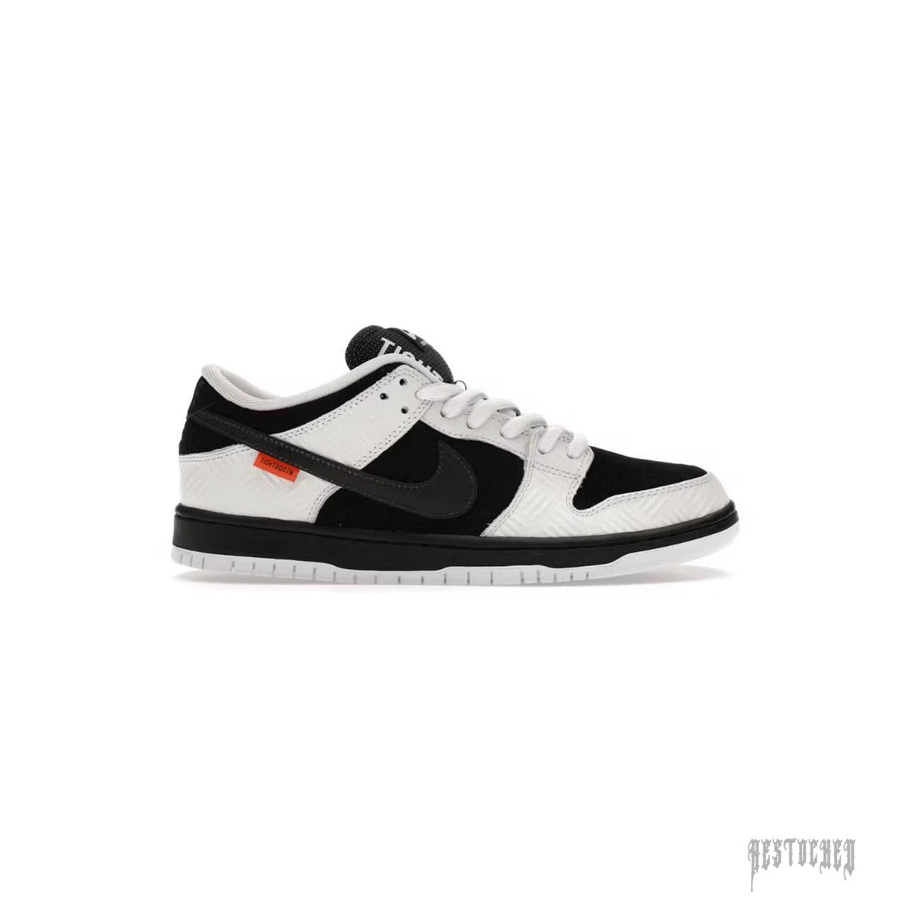 NIKE SB DUNK LOW TIGHTBOOTH sneaker, black suede and white textured leather, black swoosh, orange tag.