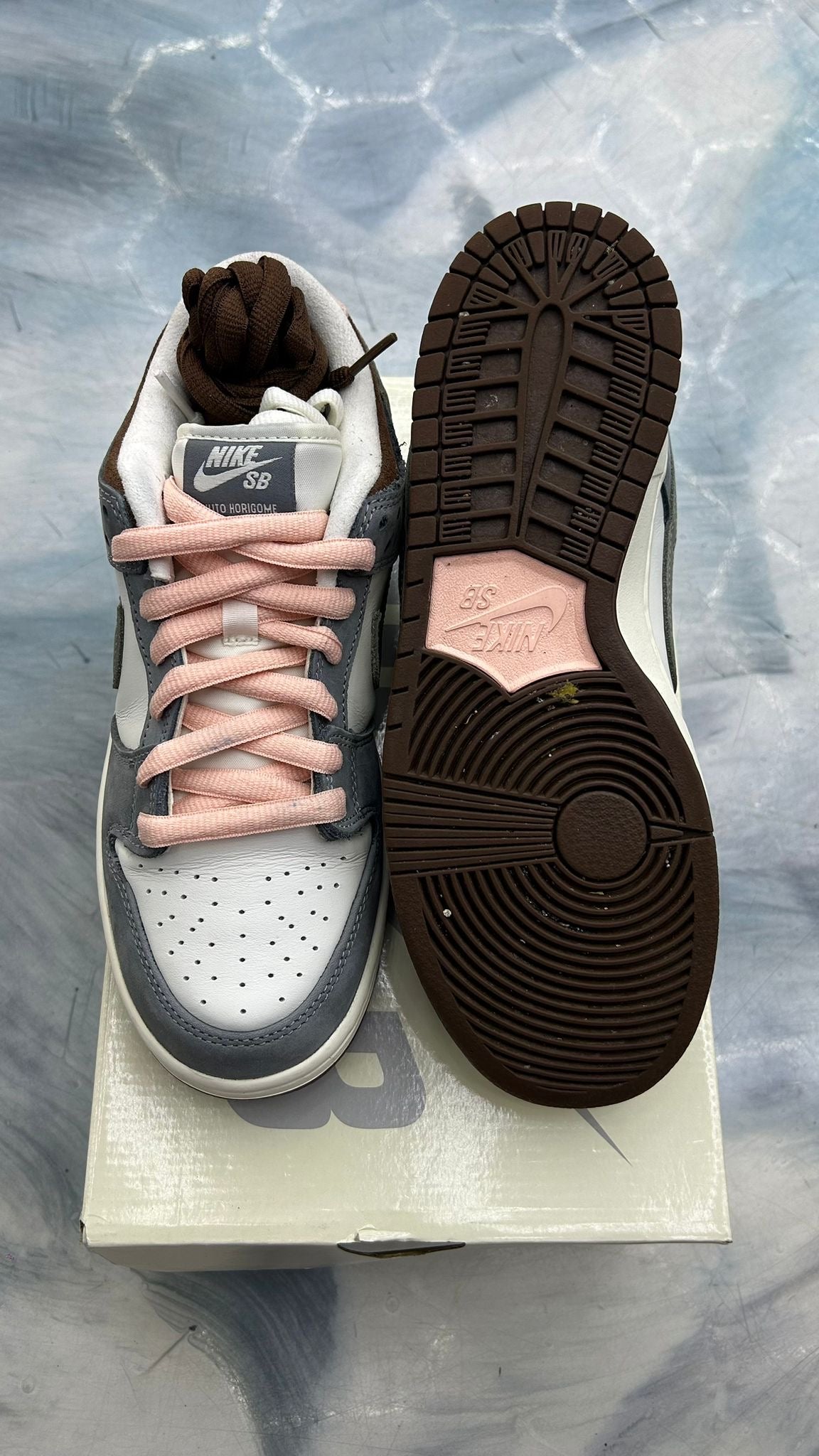 NIKE SB DUNK LOW YUTO HORIGOME size 7, white/grey leather with pink laces and brown sole.