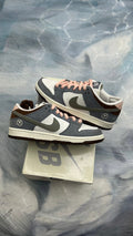 NIKE SB Dunk Low Yuto Horigome pre-owned size 7, grey, white, brown, and pink with unique bird logo.