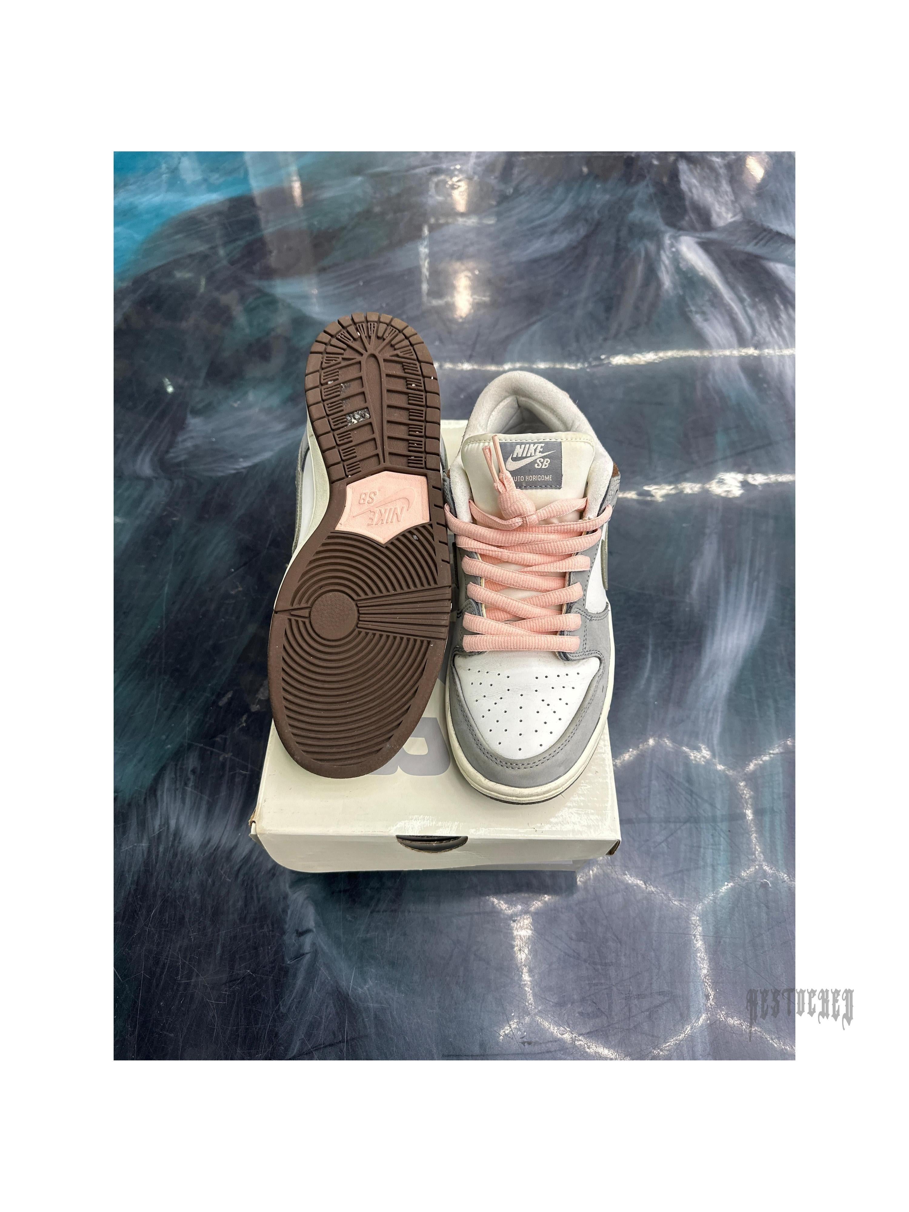 Pre-owned Nike SB Dunk Low Yuto Horigome, size 7.5, with pink laces and brown sole.