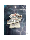 Pre-owned Nike SB Dunk Low Yuto Horigome, size 7.5, light grey and brown suede with white swoosh and pink laces.