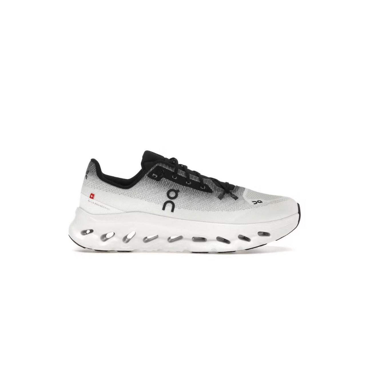 ON RUNNING CLOUDTILT Black Ivory sneaker with gradient mesh upper, black laces, and white cushioned sole.