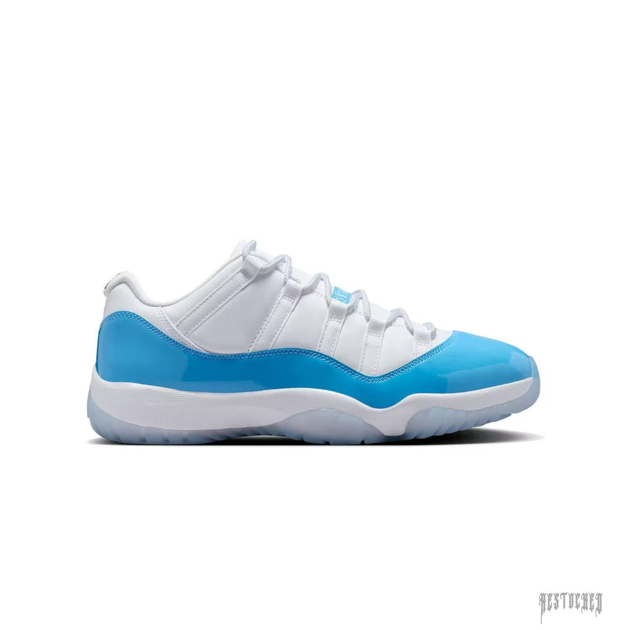 Jordan 11 Retro Low University Blue sneaker, white upper with glossy light blue patent leather mudguard.